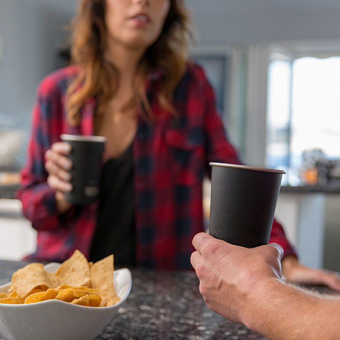 16oz-pint-cup-y2 16ounce_steel_pint_cup_black_party_lifestyle_e7c4b89f-bee2-44df-bb63-bc286febb421.jpg