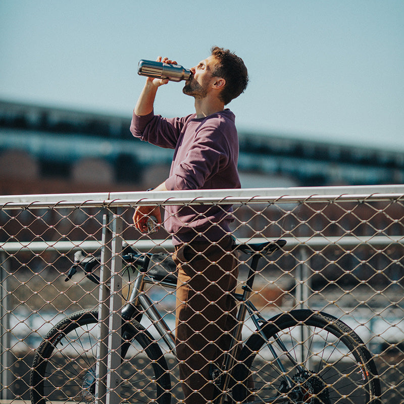 16oz-rise-reflect-with-bamboo-cap-a9 16oz_rise_reflect_man_bike_square.jpg