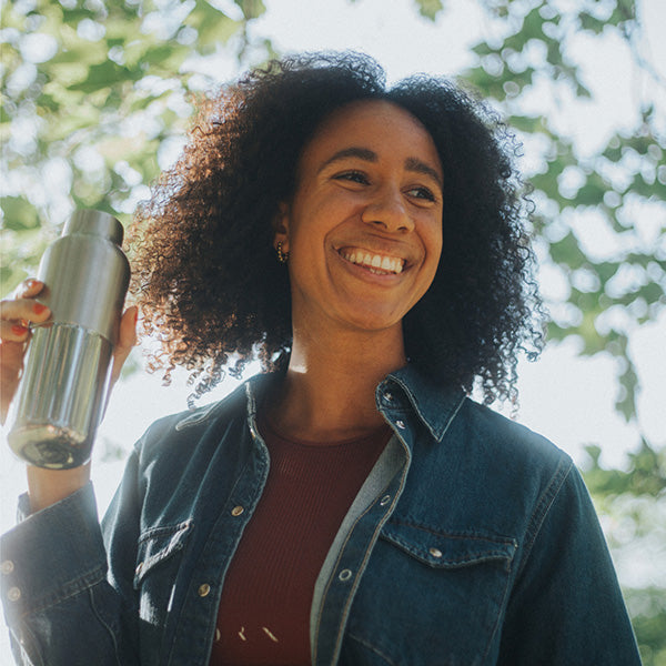 bring-your-own-party-kit-tumblers-and-cocktails-i5 16oz_rise_reflect_woman_smile_square.jpg