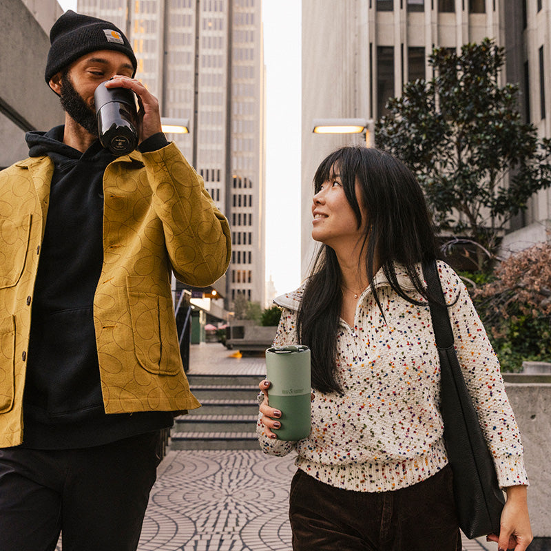 bring-your-own-party-kit-pints-and-tumblers-r0 16oz_rise_tumbler_black_iceberg_couple_drink_city_street_square.jpg