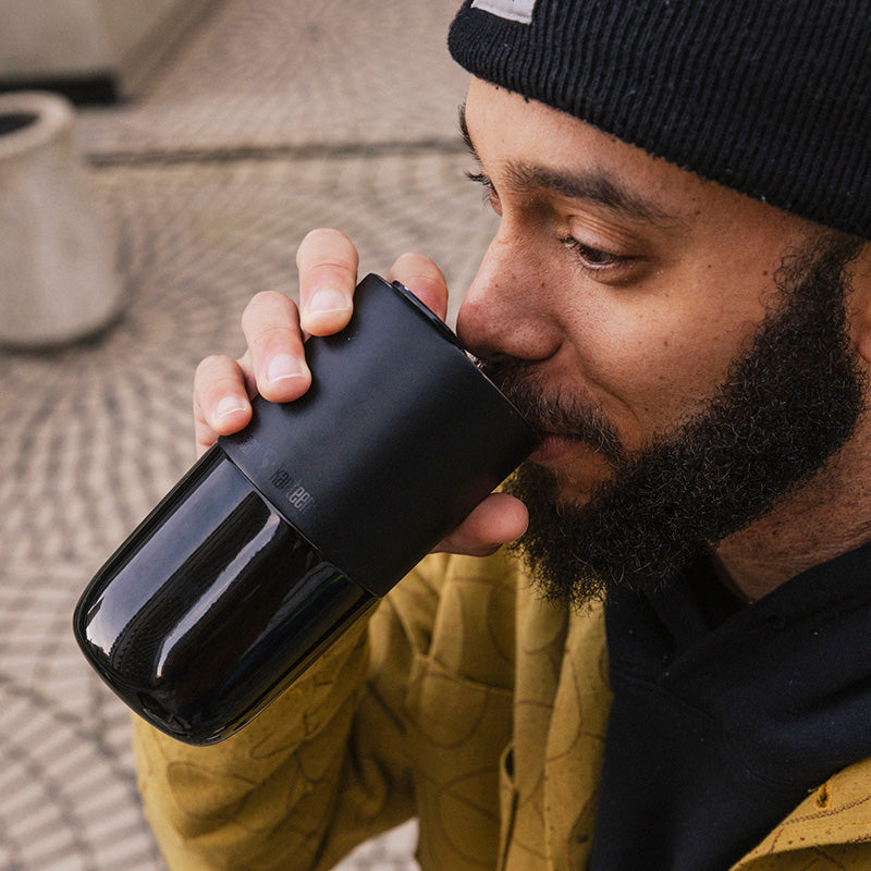 16oz-rise-tumbler-x7 16oz_rise_tumbler_black_man_drink_square.jpg