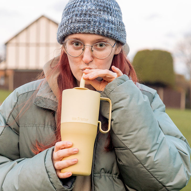 26oz-rise-tumbler-with-straw-lid-d7 26oz_rise_rumbler_straw_wax_yellow_woman_sip_square.jpg
