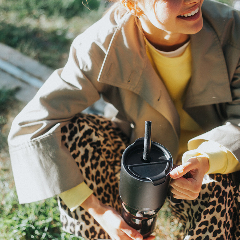 26oz-rise-tumbler-with-straw-lid-d7 26oz_rise_tumbler_black_woman_topview_square.jpg