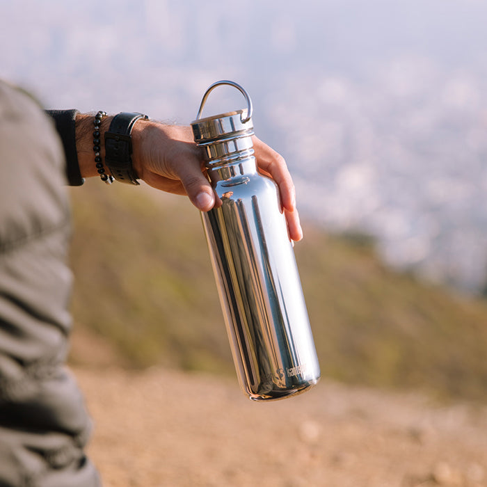 27oz-reflect-with-bamboo-cap-r9 K27SSLRF-MS-BAMBOO_reflect_bottle_hand_lifestyle.jpg