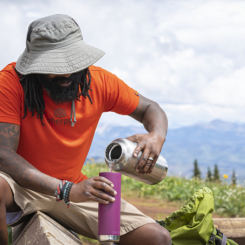 64oz-tkwide-with-loop-cap-j3 tkwide_64oz_bottle_backpacker_mountains_filling_square.jpg